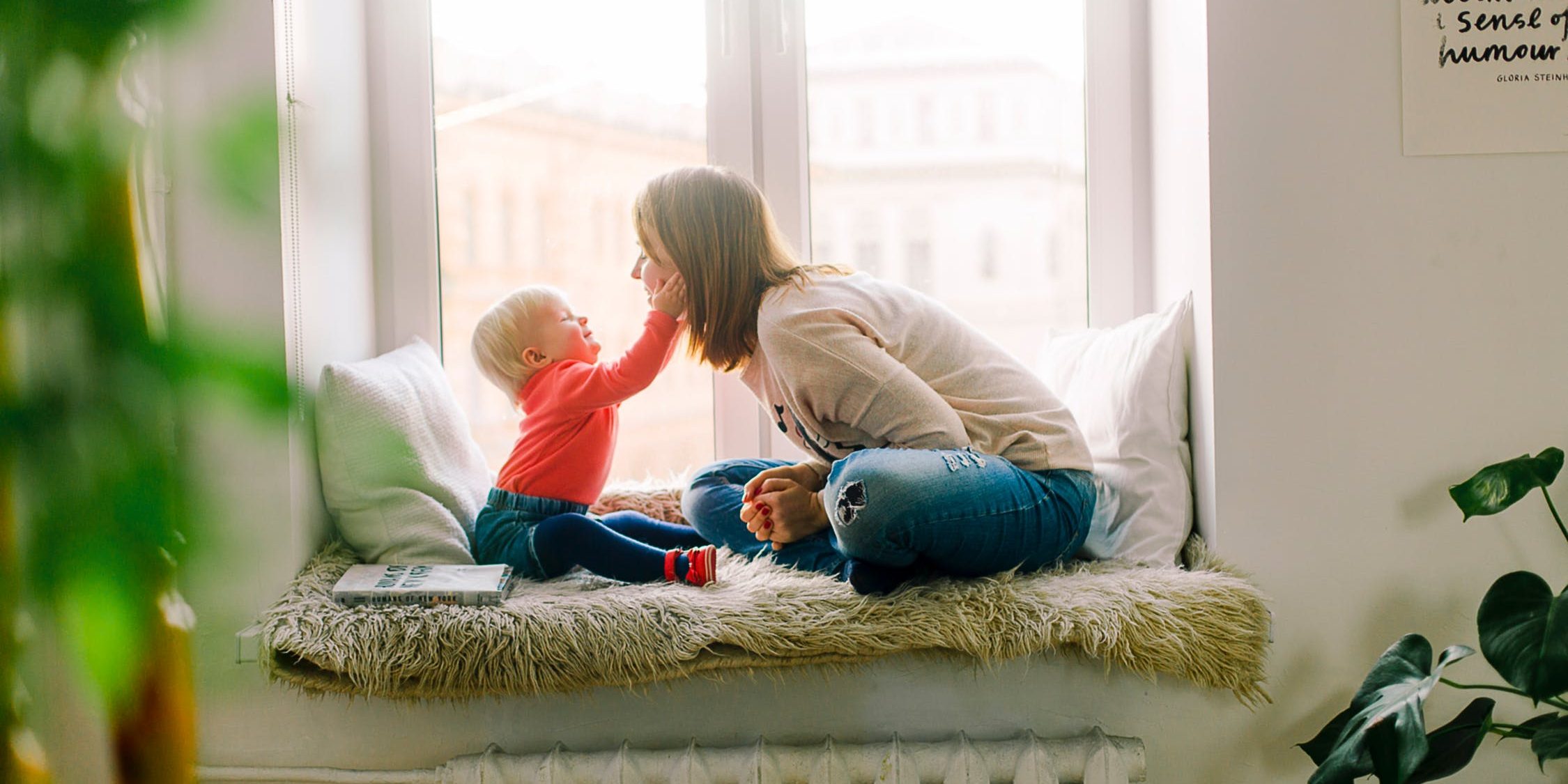 child and lady playing together