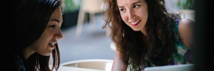 What’s the difference between a temporary staff agency or a placement agency? ladies looking at pc