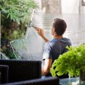 man cleaning windows