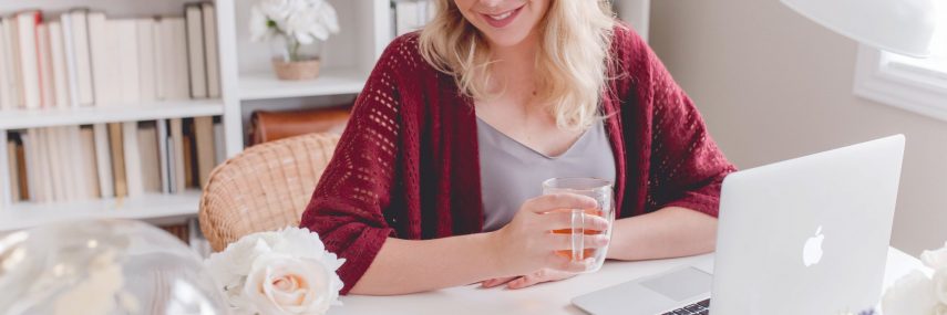 hire-domestic-staff-guide-2020 girl working happy at pc