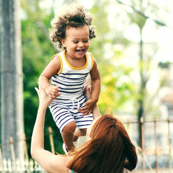 mother-playing-with-child norland nanny