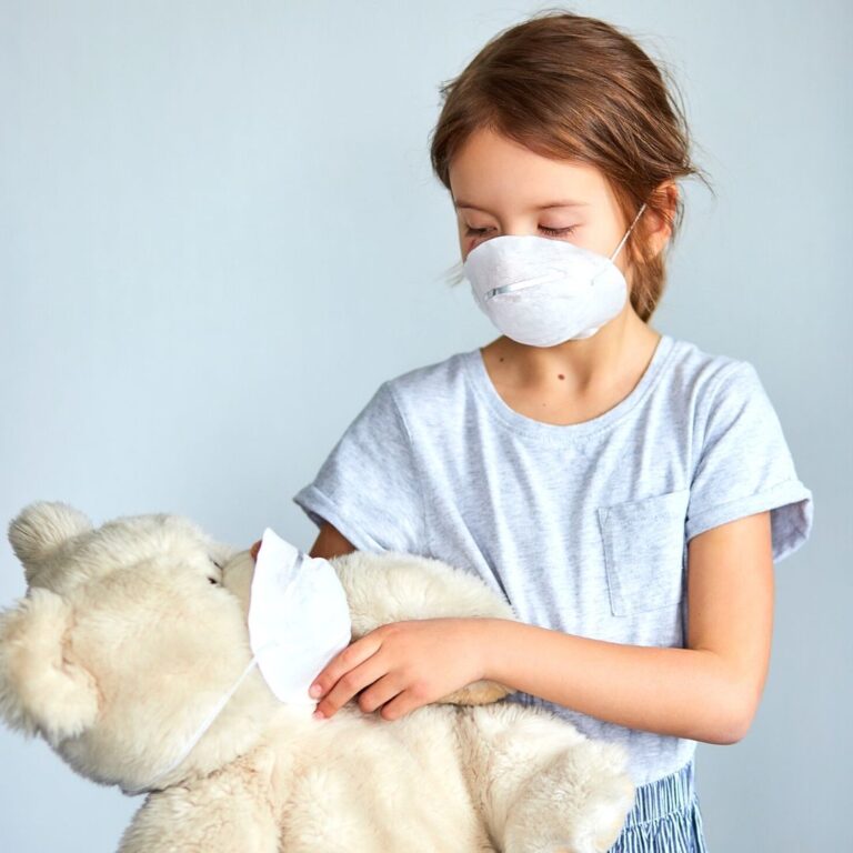 toy mask children with mask and teddy bear