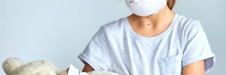 children with mask and teddy bear