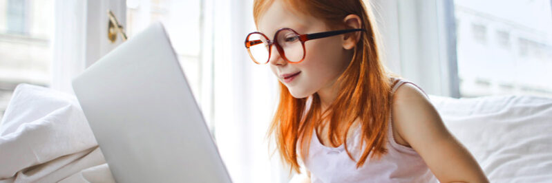 online-tutor Child learning on laptop