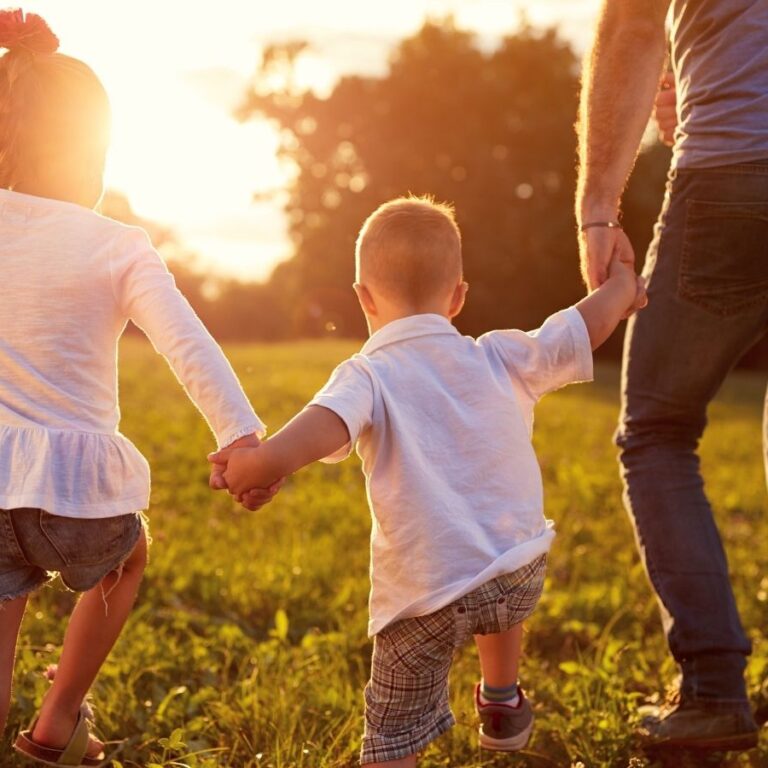 employ a norland nanny happy family at sunset