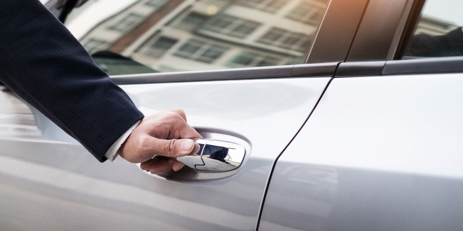 hire a chauffeur driver london personal chauffeur opening door