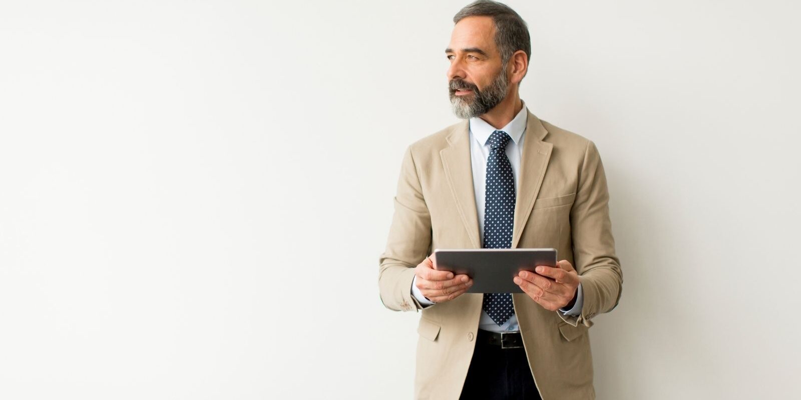house manager surrey man in suit with tie